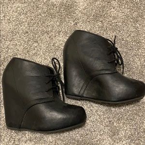 Black wedge booties